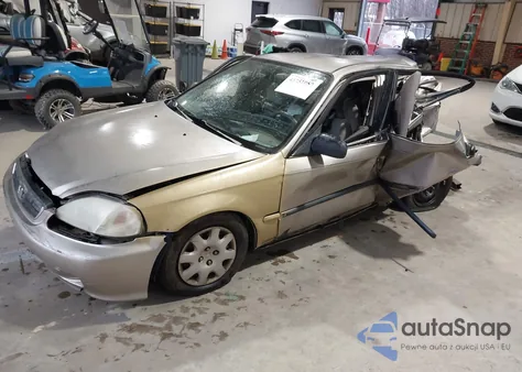 2000 Honda Civic Lx z USA, uszkodzony, nr VIN 1HGEJ667XYL038812